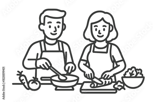 Happy couple cooking meal together in the kitchen preparing fresh healthy food