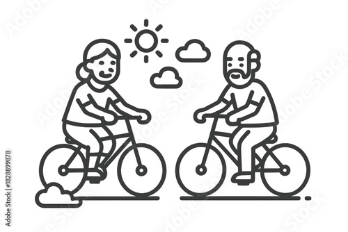 Active senior couple cycling outdoors enjoying healthy retirement lifestyle