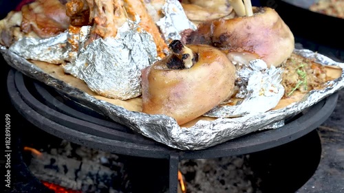 Cooking appetizing pieces of baked meat, street food
