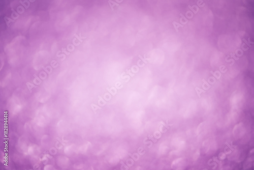 Defocus lights purple. Blurred purple background with a bright center.