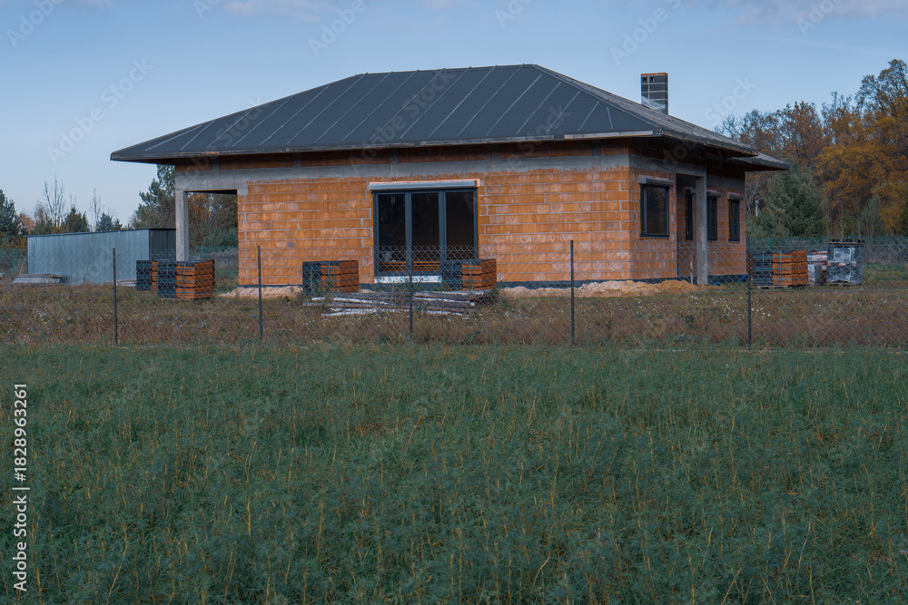 Obraz premium Construction of a single-family house made of red ceramic blocks.