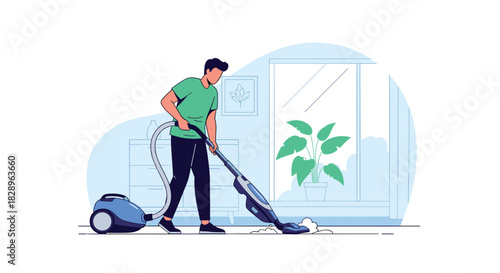 A young man doing household chores by cleaning the carpet with a modern vacuum cleaner in a bright living room at home.