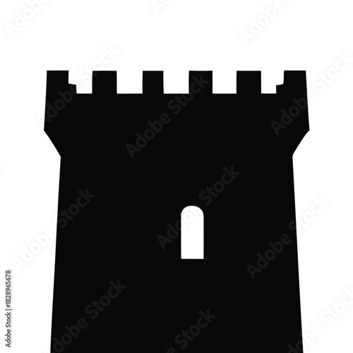 Black silhouette of a castle tower with battlements and a window fortress architecture