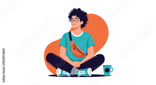 Relaxed young man with curly hair and glasses meditating or chilling while sitting cross-legged with a mug beside him.