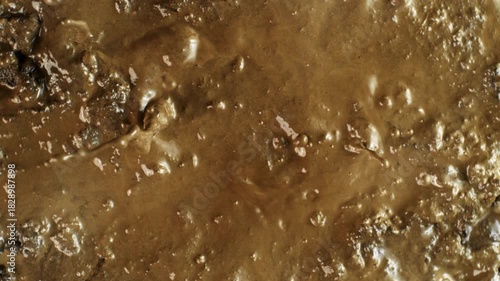 Super Slow Motion Shot of Splashing Mud Background at 1000fps.