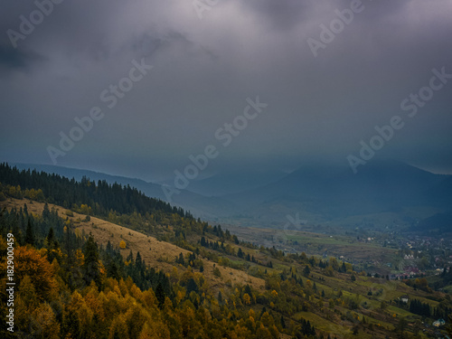 Misty Autumn Rain Clouds over Ukrainian Carpathian Mountains.