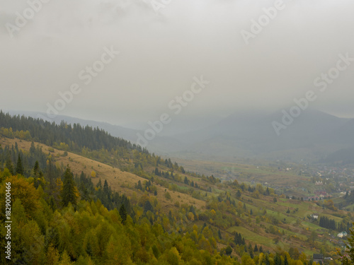 Misty Autumn Rain Clouds over Ukrainian Carpathian Mountains.