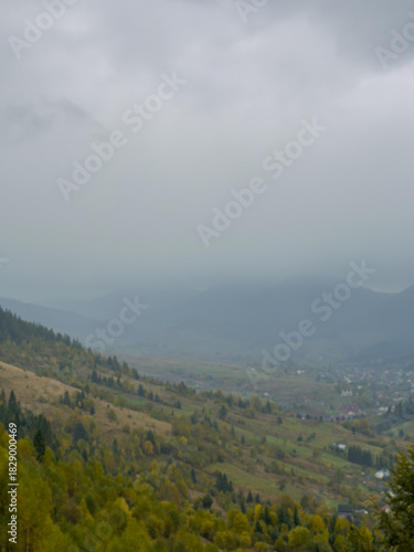 Misty Autumn Rain Clouds over Ukrainian Carpathian Mountains.
