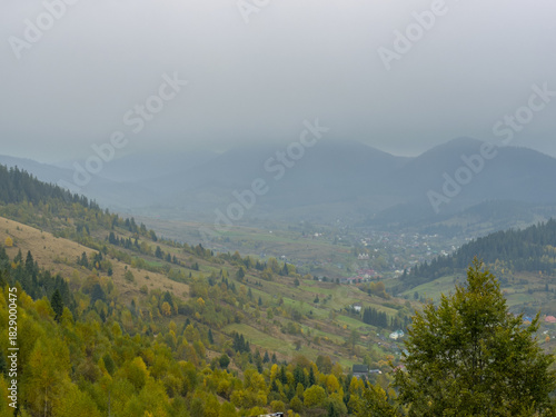 Misty Autumn Rain Clouds over Ukrainian Carpathian Mountains.