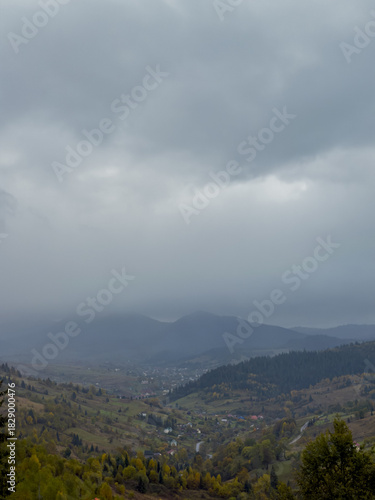 Misty Autumn Rain Clouds over Ukrainian Carpathian Mountains.