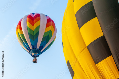 Fotografía Two hot air balloons fly over Midland, MI.