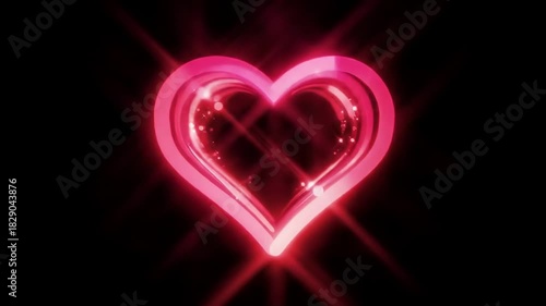 A glowing red heart shape shines in darkness with light rays emanating from it