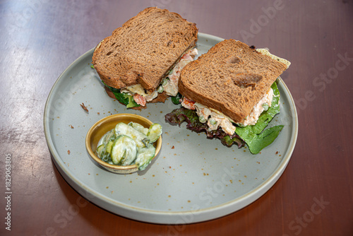 Gourmet Sandwich with Artisan Bread, Egg, and Pickles