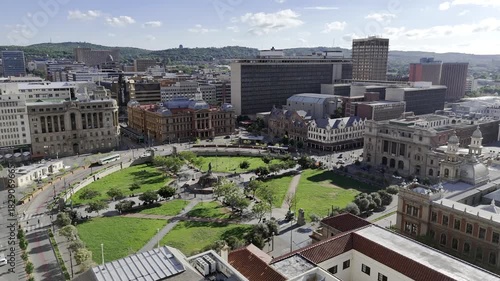 Drone orbits to the right on the northeastern side of Church Square on sunny day in Pretoria, South Africa