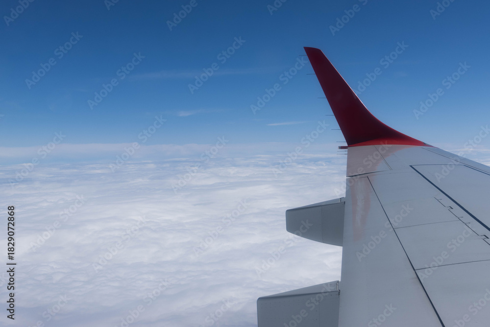 Obraz premium View from the plane wing and clouds, Italy