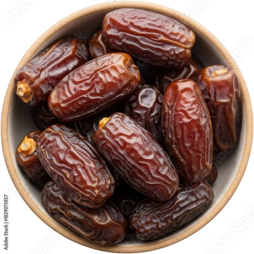 Wallpaper Mural A close up overhead view of a ceramic bowl filled with ripe dark brown sweet dates their wrinkled textures visible food fruit dried fruit healthy natural Torontodigital.ca