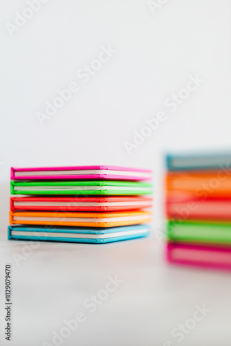 colourful children books on minimalist setup, concept of learning to read and early education