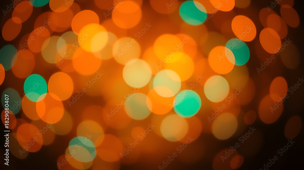 Fototapeta premium Softfocus bokeh scene featuring radiant orange and turquoise circles embellished with light particles providing a serene and calming ambiance ideal for wellness or relaxationthemed