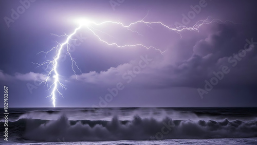 Huge lightning strike over a dark ocean.