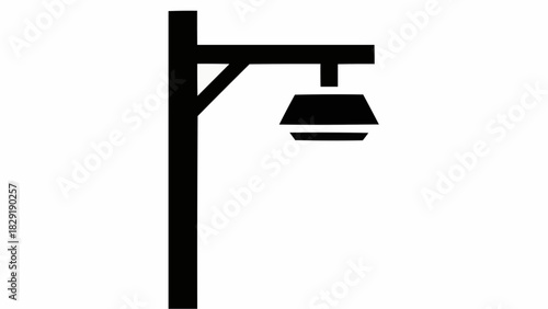 A simple black silhouette of a classic street lamp or lamppost against a plain white background.