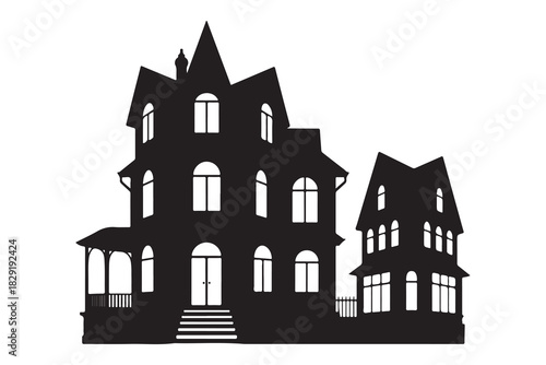  Spooky victorian mansion with a smaller adjoining building in a stark black silhouette