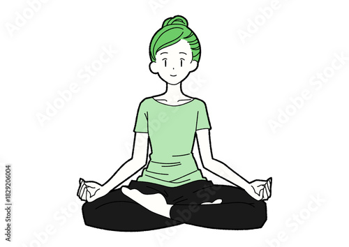 ヨガで瞑想する女性 緑色