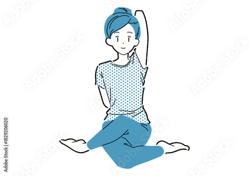 ヨガで腕を伸ばす女性