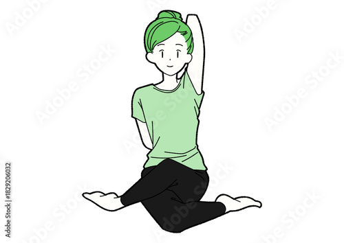 ヨガで腕を伸ばす女性 緑色