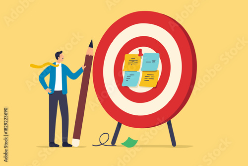 Goal setting, achievable target or purposeful objective, mission to accomplish or challenge to win for business success concept, businessman write down goal on notes and put on big dartboard target.