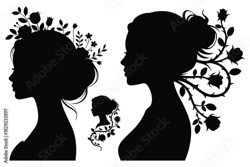 Black silhouette profiles of women adorned with floral elements