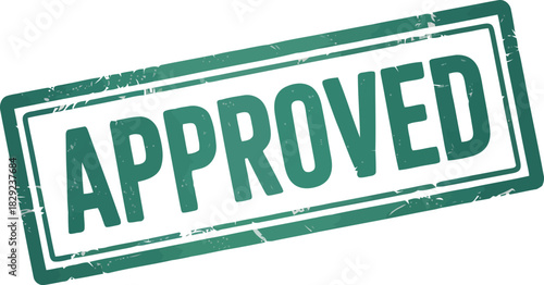 A worn teal green approved rubber stamp seal with textured edges on a crisp white background