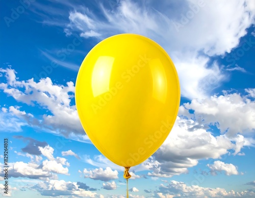 Vibrant yellow balloon soaring in a bright, wispy cloud filled sky