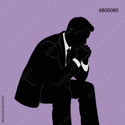 Silhouette of a thoughtful businessman in deep contemplation.