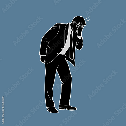 Businessman in despair covering face with hand due to stress.
