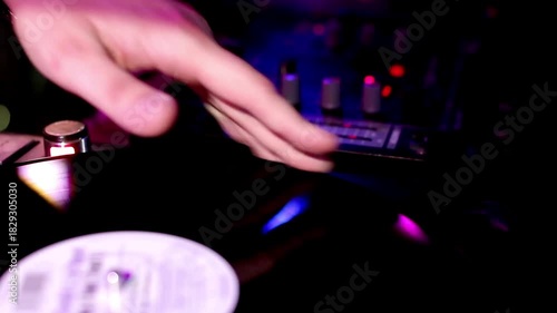 plays for dj mixer mixing music with professional equipment