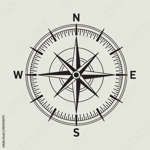 Classic black and white compass navigation symbol