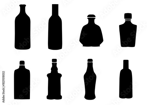 a set of bottle silhouettes on a white background