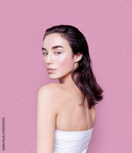 Gorgeous young woman with perfect body shape wearing lingerie underwear top looking fresh and healthy posing on pink background