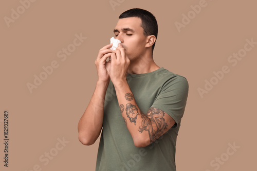 Ill young man with tissue b...