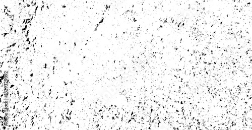 Abstract black and white texture featuring scattered particles creating a distressed grunge effect suitable for modern digital designs and overlays