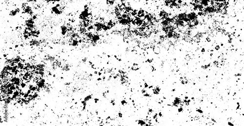 Abstract black and white background depicting a scattered pattern of small dark particles creating a distressed and noisy texture