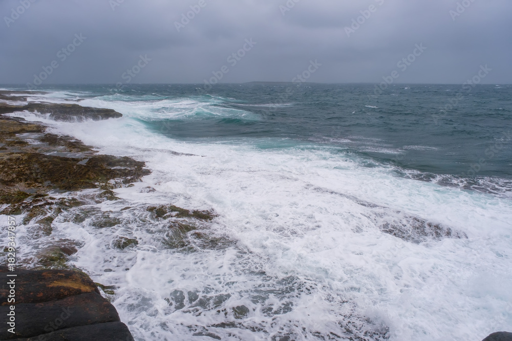 Fototapeta premium Russia, Murmansk Oblast, Rybachy Peninsula. Barents Sea coast, Orange Rocks Coast. August 2025