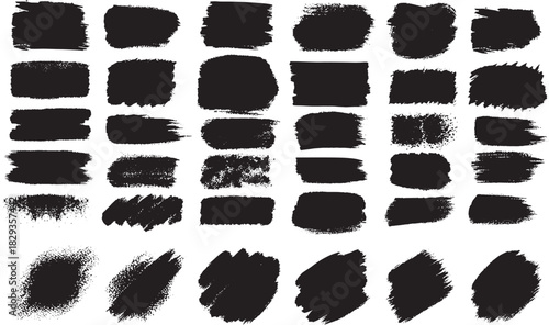Assortment of Black Paint Brush Strokes and Shapes on White Background grunge texture