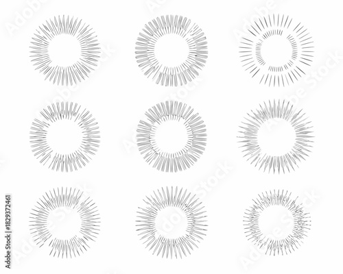 Collection of nine hand drawn sunburst starburst graphic elements