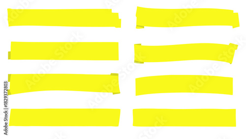 Collection of eight assorted yellow highlight marker strips on black background