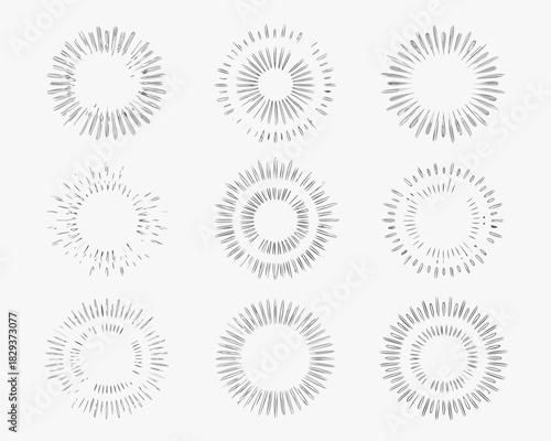 Collection of nine hand drawn sunburst rays and starburst elements
