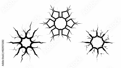Three abstract black cracked circular patterns on a white background