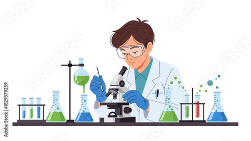 Male chemist or biologist conducting scientific research in a modern laboratory using various glassware and a microscope