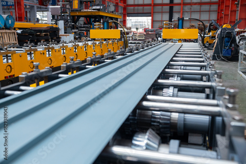 Metal Sheet Rolling Machine in Industrial Factory