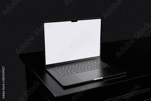 High quality laptop on black table with black background for mockup template